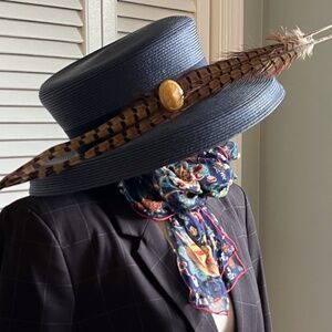Navy hat with pheasant trim